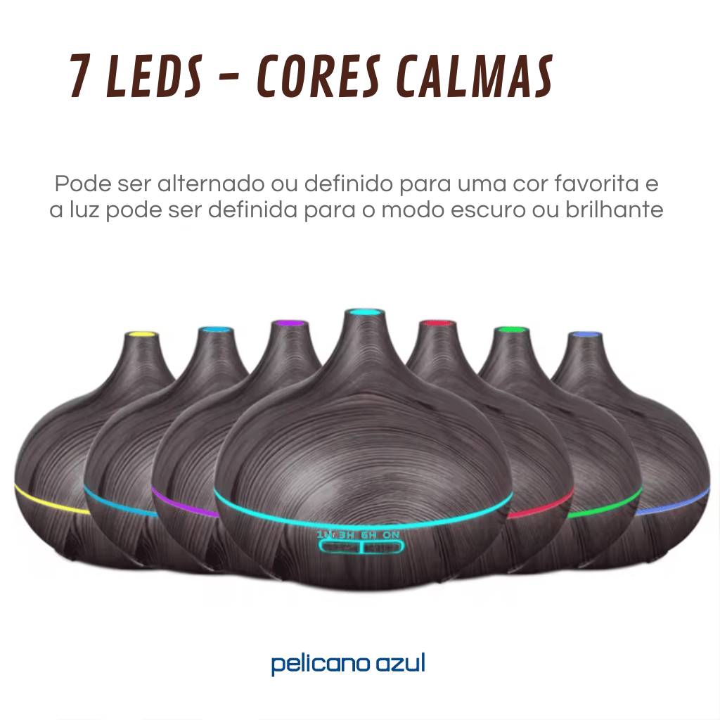 Difusor ultra-silencioso Beyond Calm modelo Dark Wood com controle remoto e luzes LED. Inclui temporizador ajustável e contém difusor de aroma, controle remoto, manual do usuário e adaptador. Ideal para aromaterapia e relaxamento. Pelicano Azul.