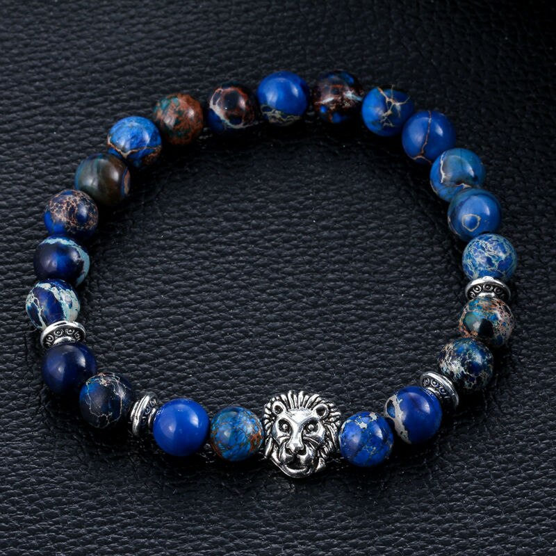 Pulseira Energética com pedras azuis naturais e detalhe de leopardo em prata, Pelicano Azul.