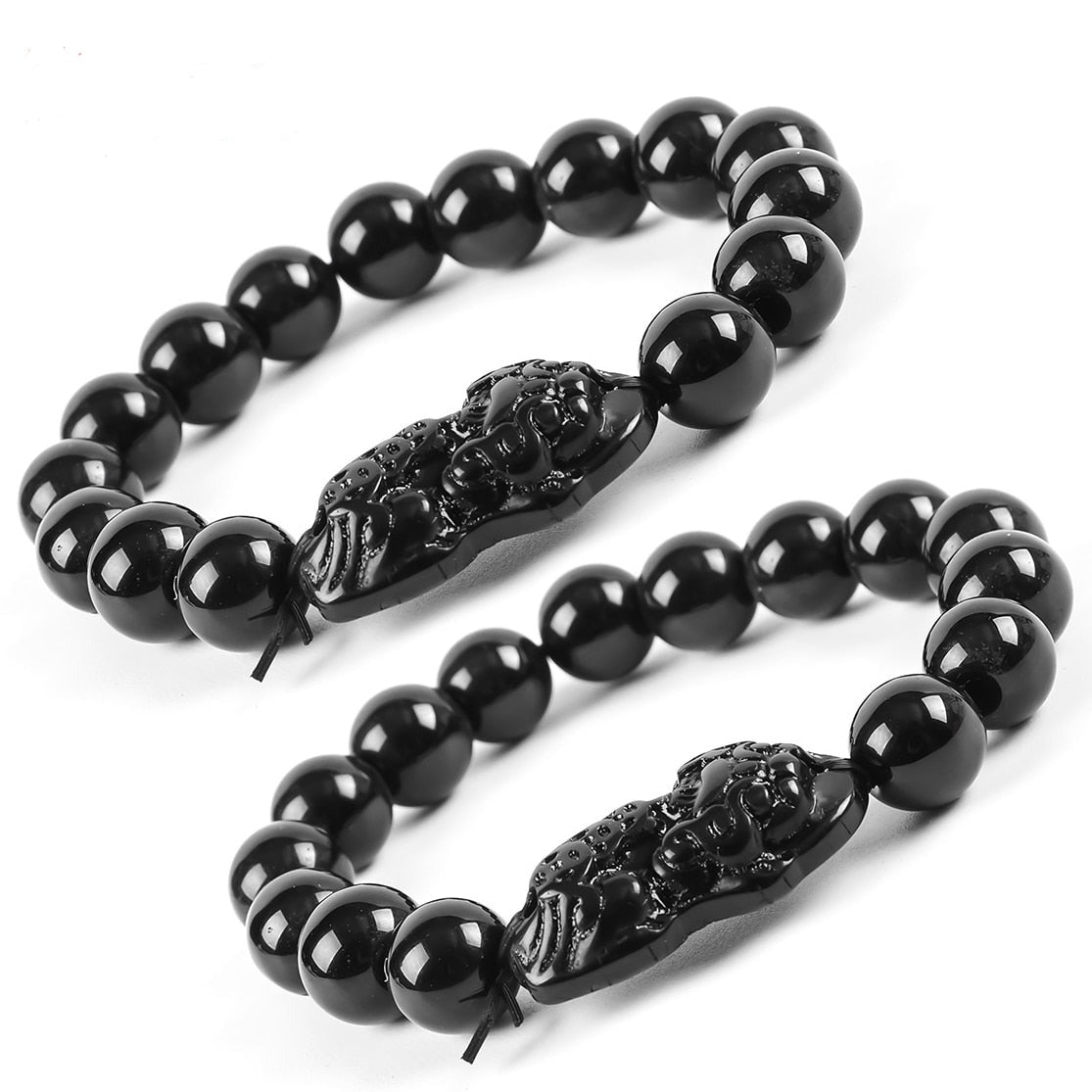 Kit de duas pulseiras Obsidiana Negra com entalhe de Feng Shui, Pelicano Azul.